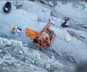 Sexo  en la playa nudista spycamed